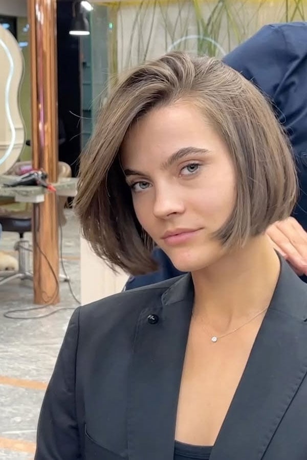 Chin Length Blunt Bob Sleek Dark Brown Side Part, Close-Up Take Chin Length Blunt Bob Sleek Dark Brown Side Part, Close-Up Take — Classy Bob for Fine Hair