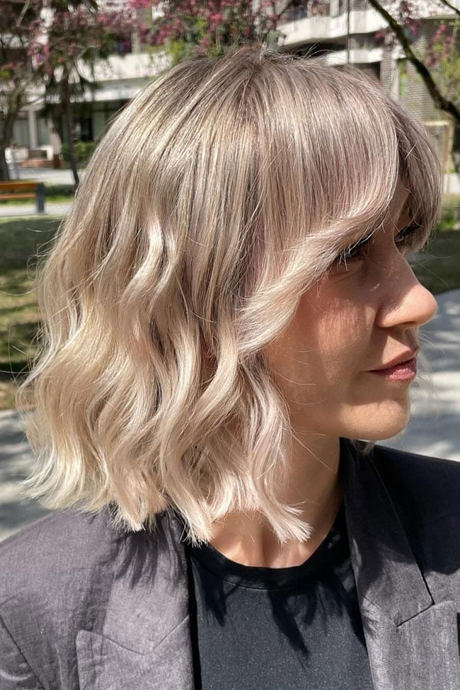 Beige Blonde Collarbone Bob With Waves Beige Blonde Collarbone Bob With Waves — Classy Bob with Curtain Bangs