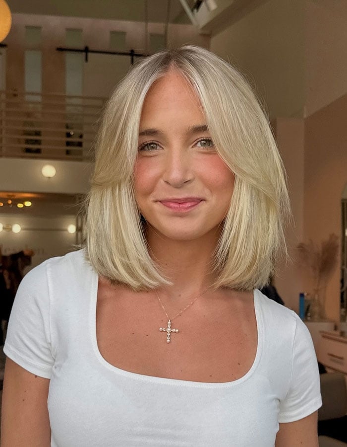 Sleek Platinum Blonde Bob With Curtain Bangs Sleek Platinum Blonde Bob With Curtain Bangs — Classy Bob with Curtain Bangs