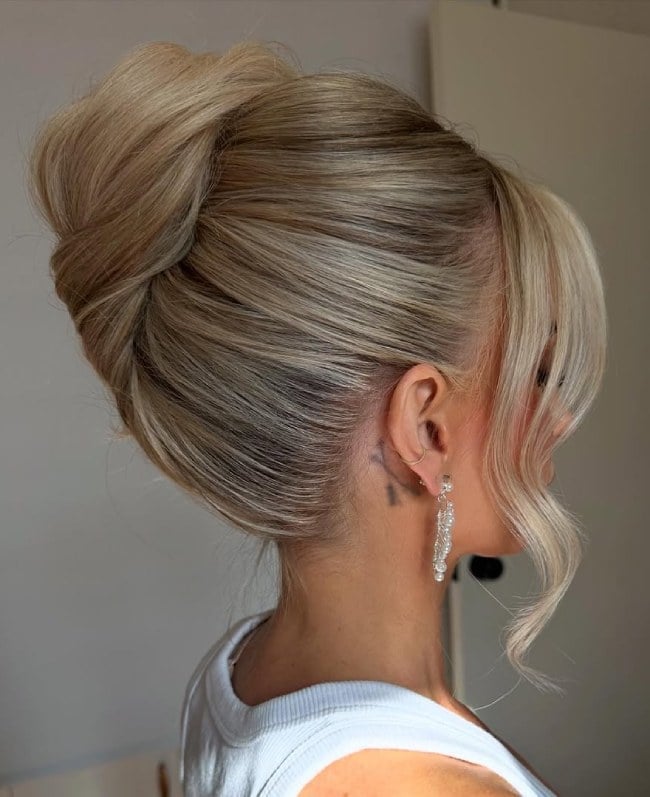 Dramatic Platinum Blonde Updo With Side Bangs Dramatic Platinum Blonde Updo With Side Bangs — Classy Bridal Bun