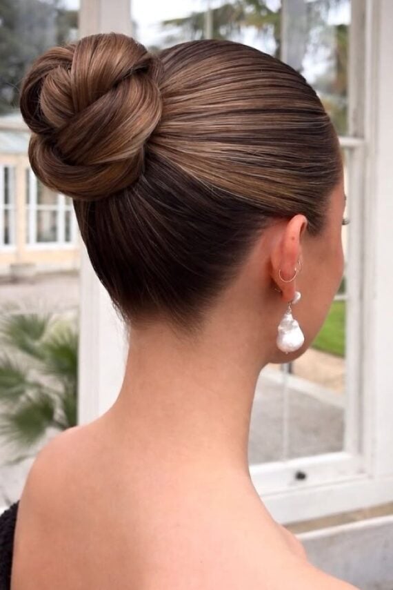 Polished High Bun With Subtle Dimension Polished High Bun With Subtle Dimension — Classy Bridal Bun