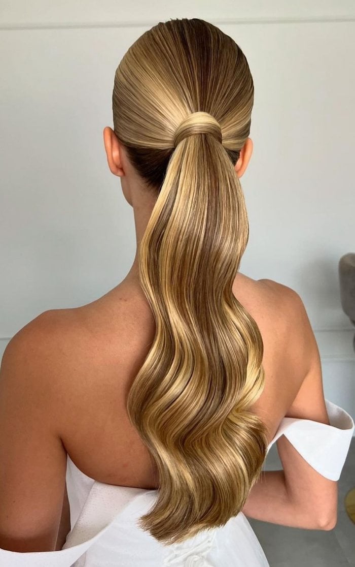 Sleek High Ponytail With Sharp Glossy Waves Sleek High Ponytail With Sharp Glossy Waves — Classy Bridesmaid Ponytail