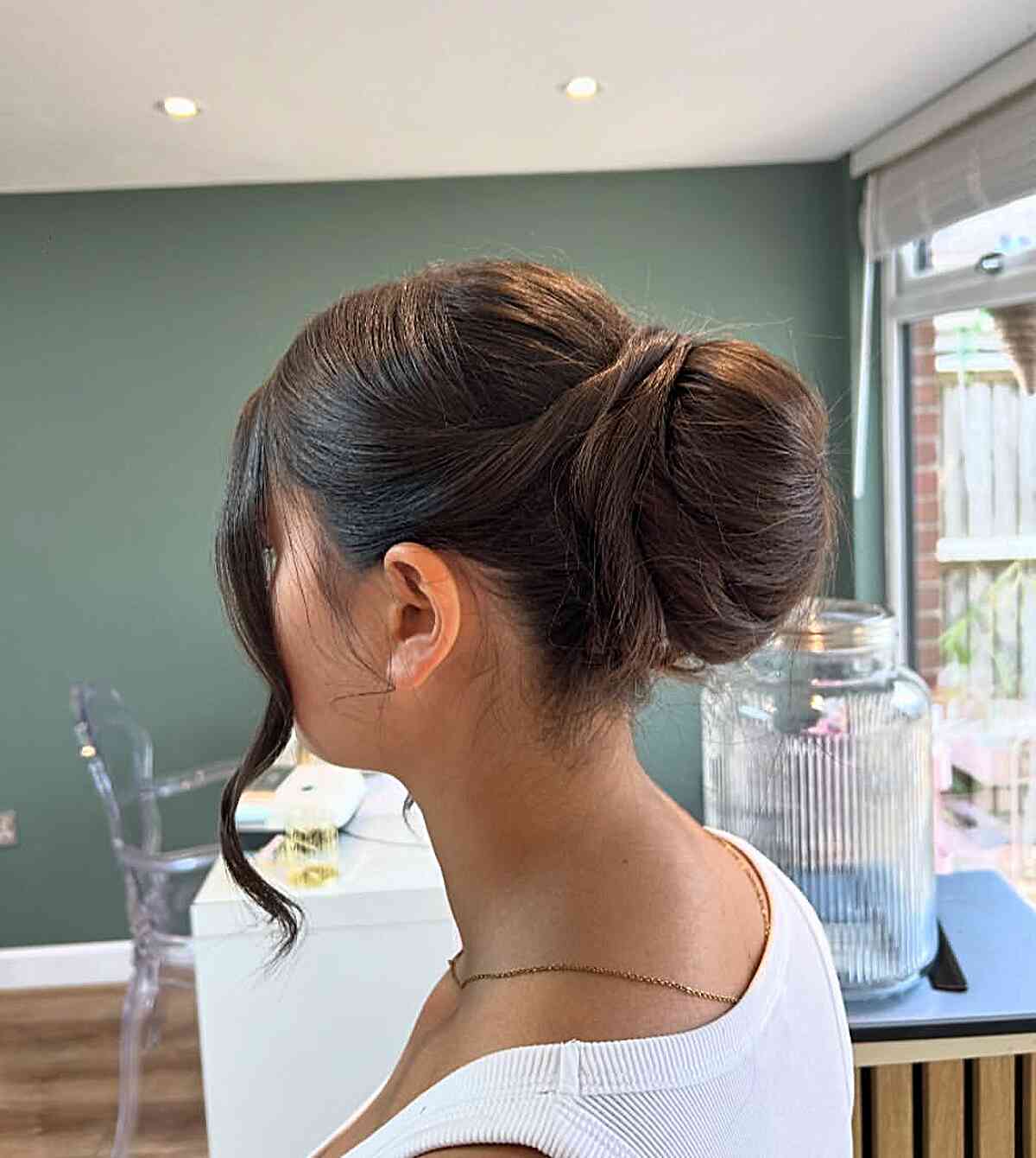 High Bun With Loose Wispy Bangs and Blonde With Highlights — Classy Bun and Bang