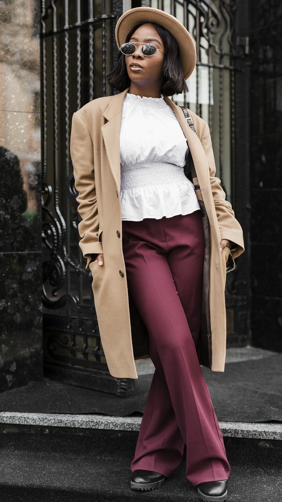 Burgundy Wide-Leg Trousers With Ruffled Blouse And Camel Coat Burgundy Wide-Leg Trousers With Ruffled Blouse And Camel Coat — Classy Burgundy Pants Outfits
