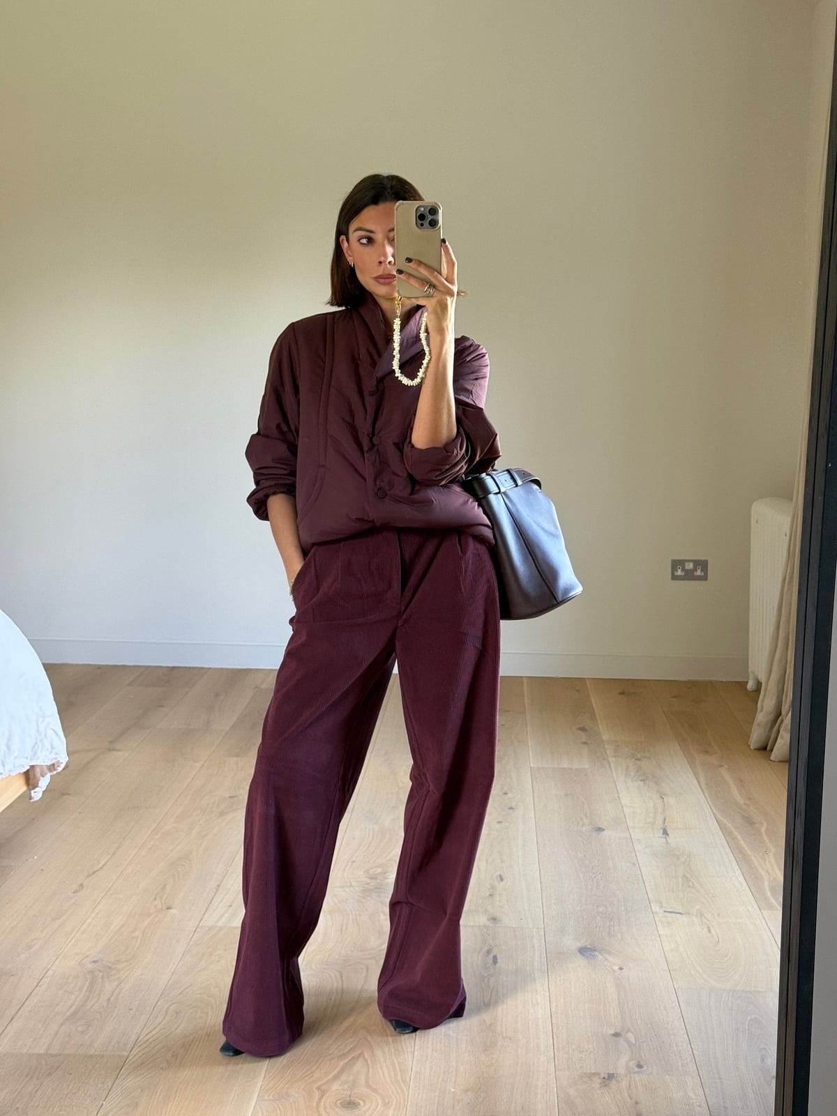 Monochromatic Burgundy Corduroy Trousers With Puffer Jacket Monochromatic Burgundy Corduroy Trousers With Puffer Jacket — Classy Burgundy Pants Outfits