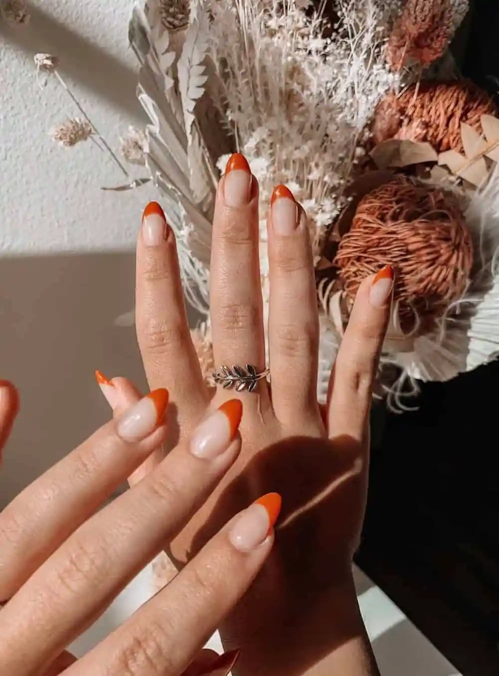Glossy Burnt Orange French Tip Medium Almond Nails, Close-Up Take Glossy Burnt Orange French Tip Medium Almond Nails, Close-Up Take — Classy Burnt Orange Nails