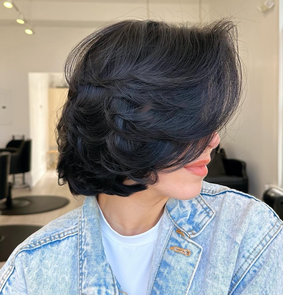 Short Black Butterfly Cut With Layered Bangs — Classy Butterfly Hair