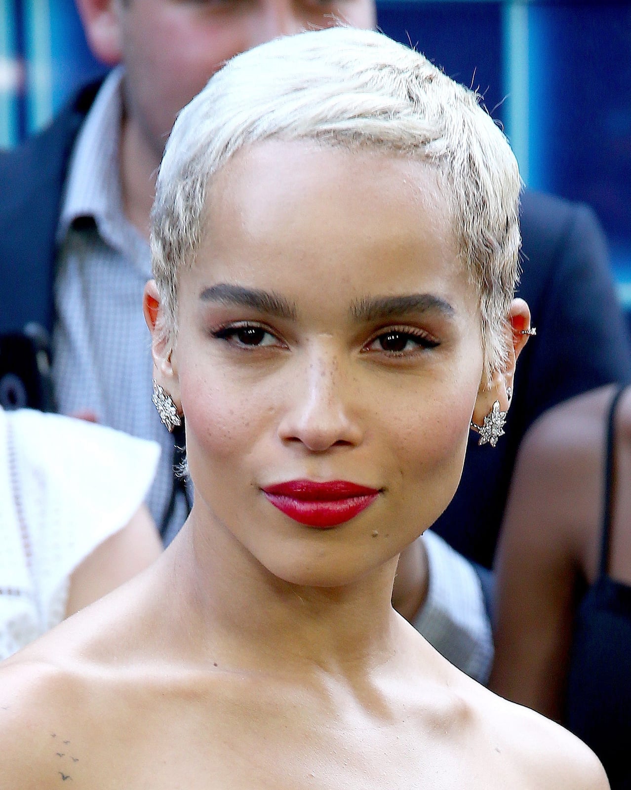 Blonde Buzz Cut With Red Lipstick And Starburst Earrings Blonde Buzz Cut With Red Lipstick And Starburst Earrings — Classy Buzz Cut