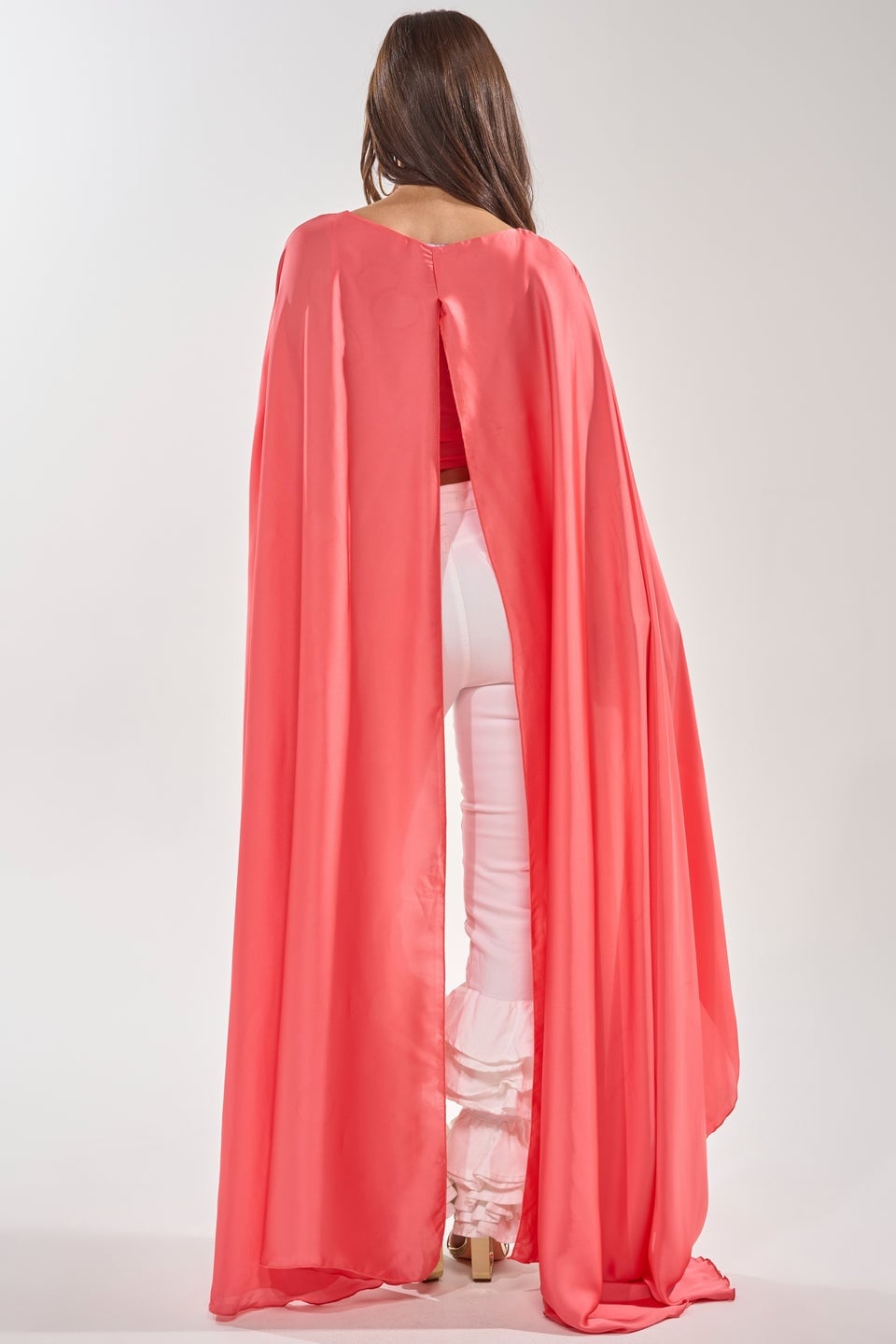 Flowing Red Cape Over Red Top and White Ruffled Pants Flowing Red Cape Over Red Top and White Ruffled Pants — Classy Cape Outfits