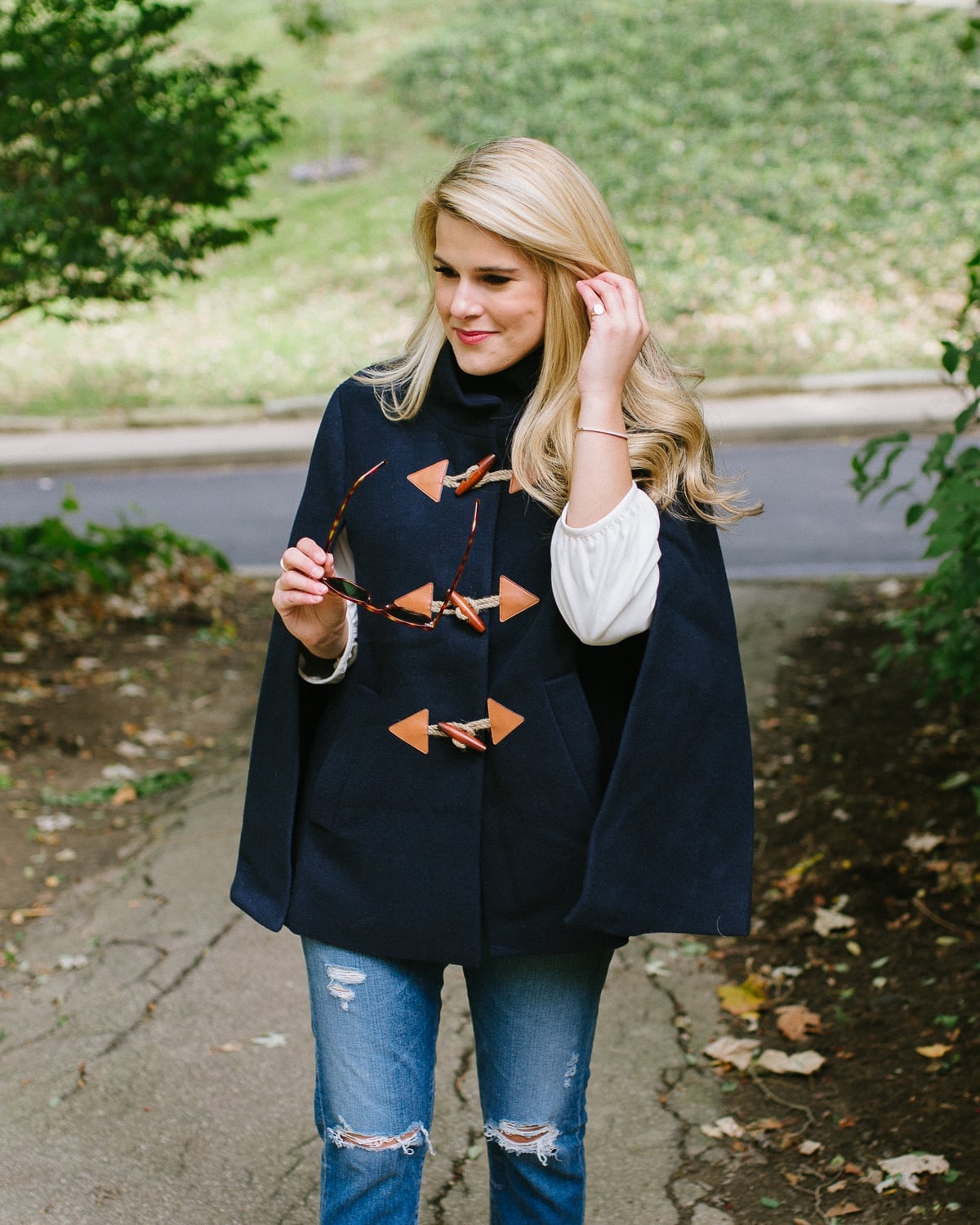 Navy Duffle Toggle Cape Coat Over Turtleneck and Jeans Navy Duffle Toggle Cape Coat Over Turtleneck and Jeans — Classy Cape Outfits
