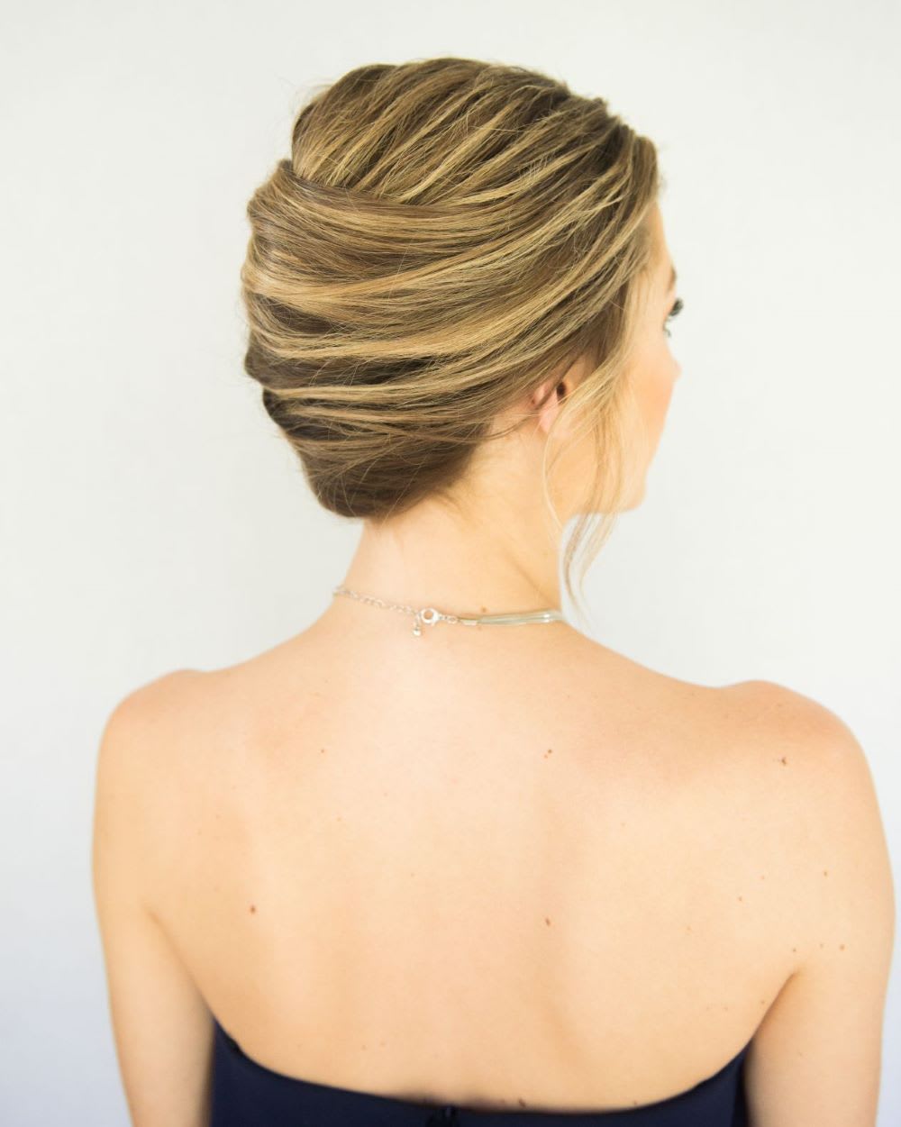 Textured Updo With Loose Strands Honey Blonde Textured Updo With Loose Strands Honey Blonde — Classy Casual Updo