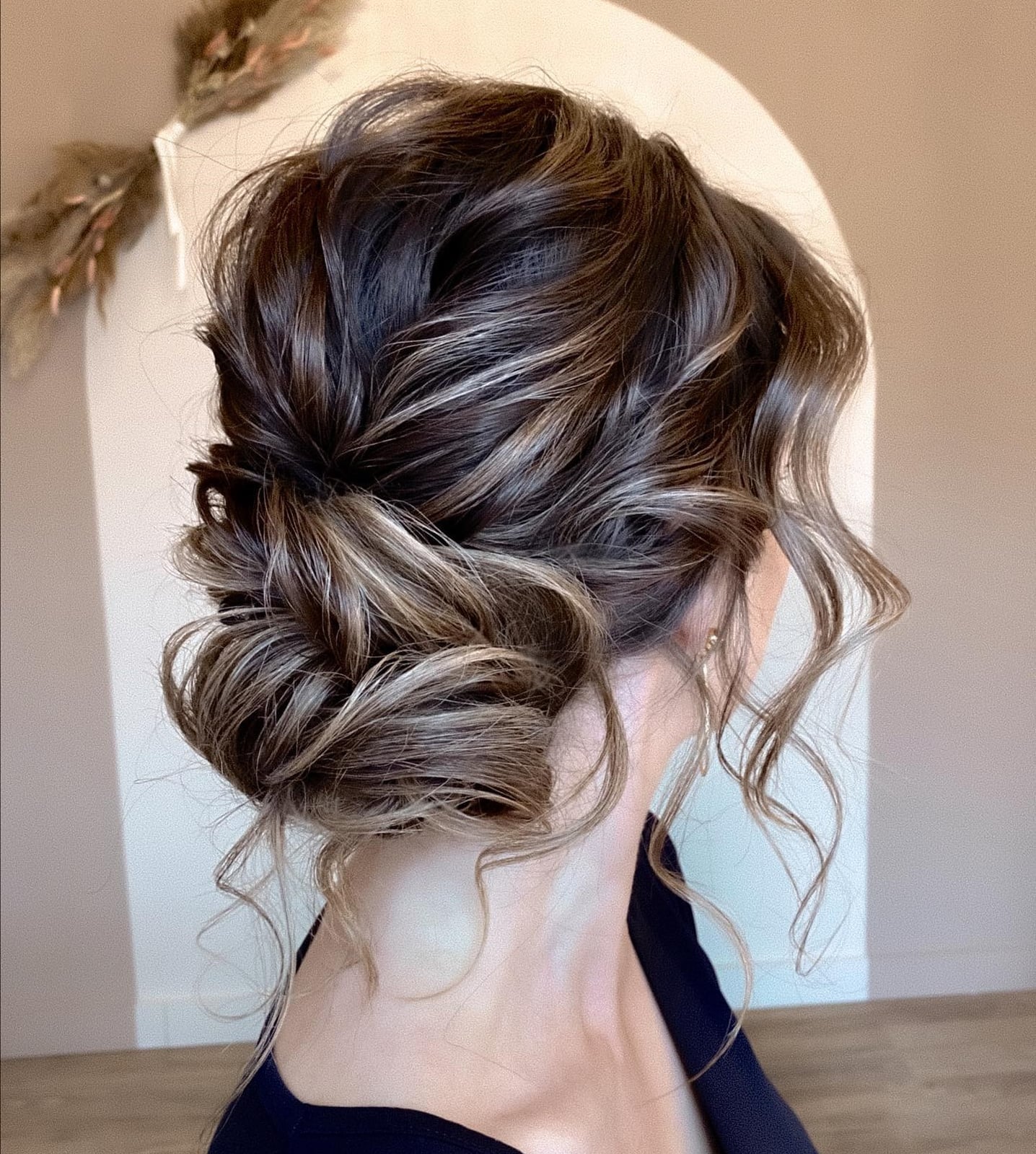 Textured Knot Updo With Wavy Strands Textured Knot Updo With Wavy Strands — Classy Casual Updo