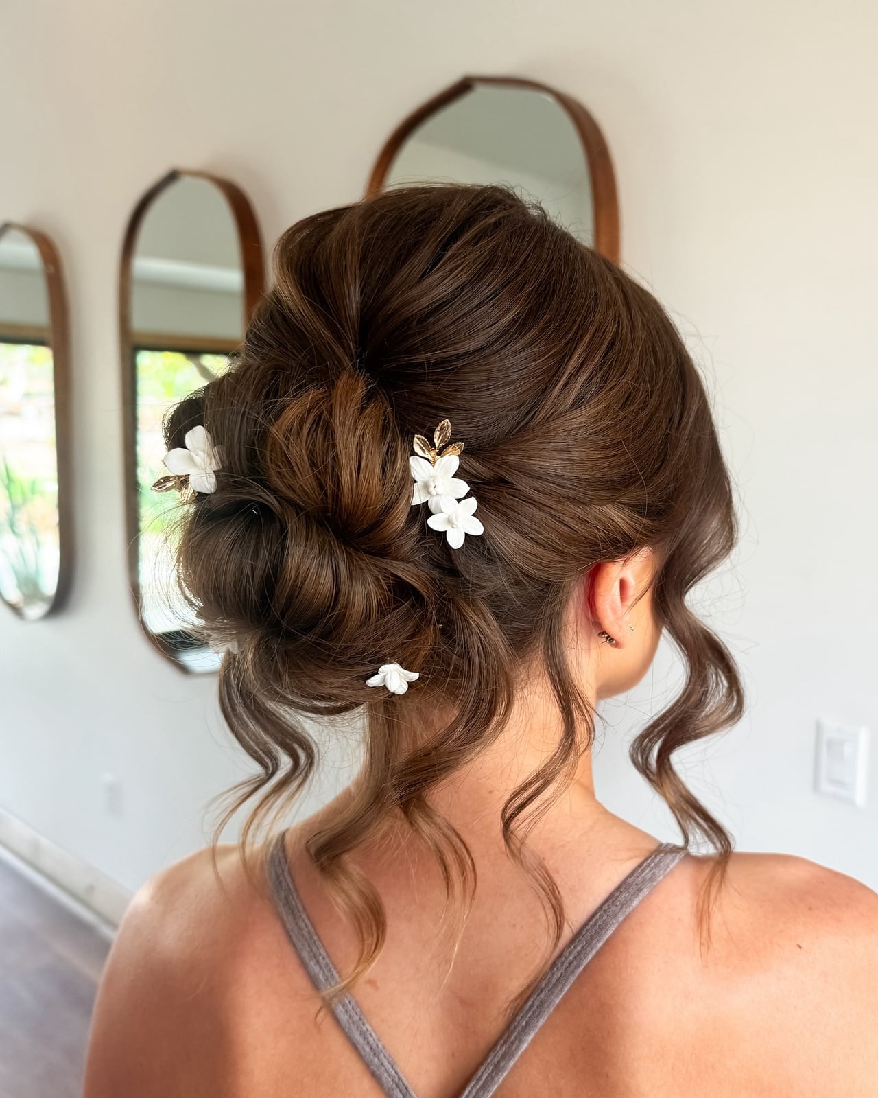 Chignon With Loose Tendrils And Decorative Pins Chignon With Loose Tendrils And Decorative Pins — Classy Casual Updo