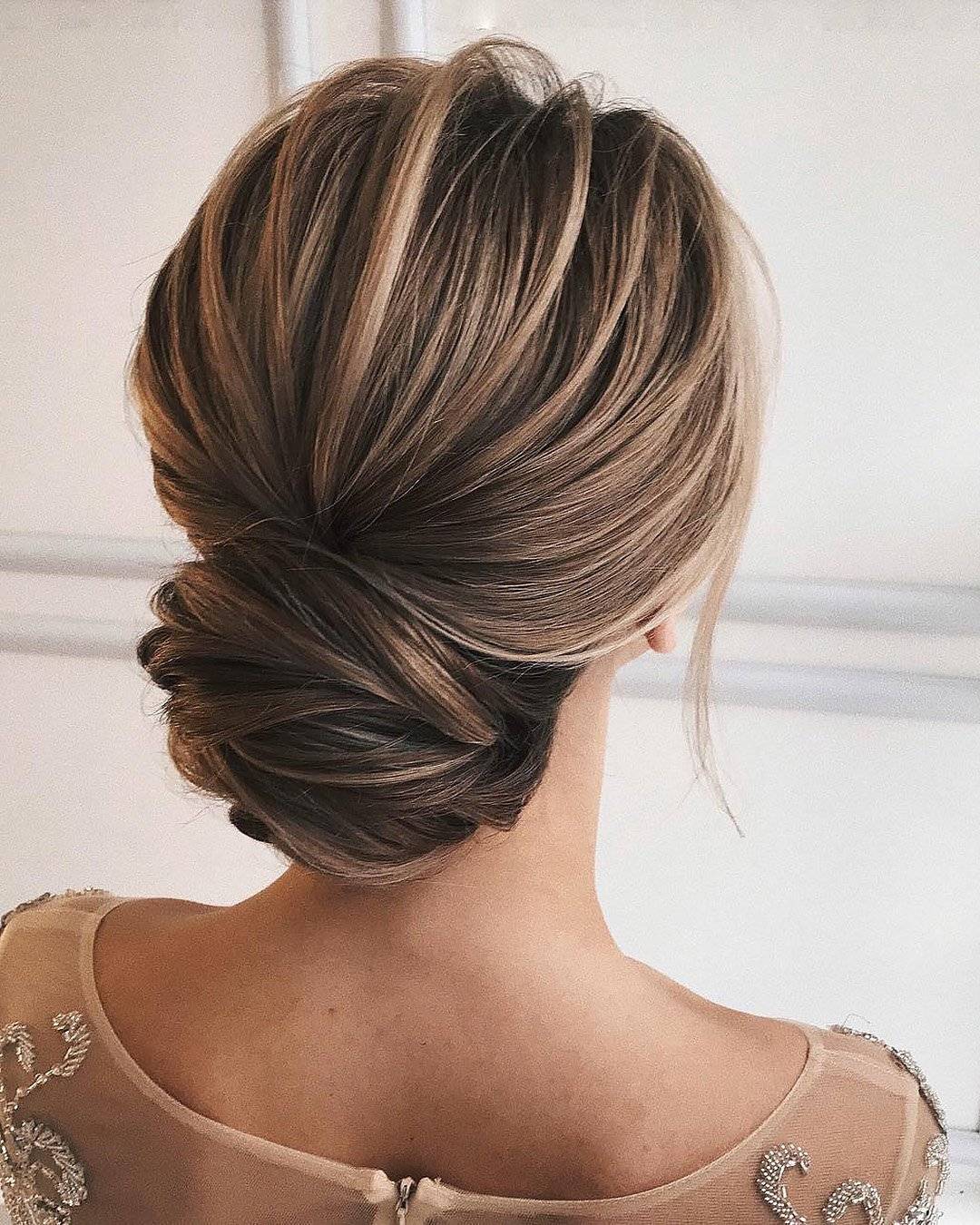 Smooth Low Chignon With Honey Blonde Highlights Smooth Low Chignon With Honey Blonde Highlights — Classy Casual Updo