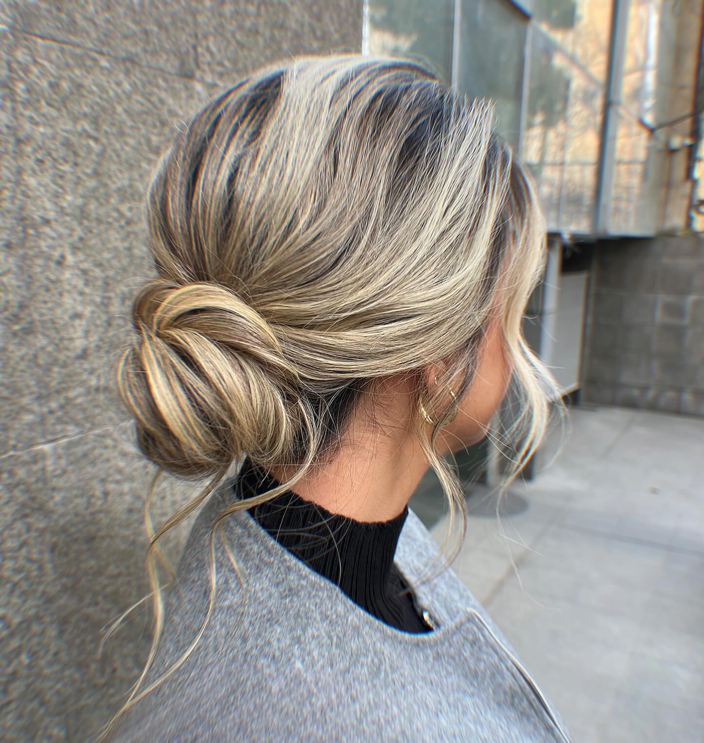 Twisted Ash Blonde Low Bun With Face-Framing Twisted Ash Blonde Low Bun With Face-Framing — Classy Casual Updo