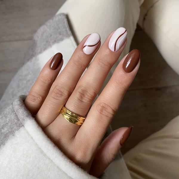 Sheer Nude Almond Nails with Chocolate Swirls Sheer Nude Almond Nails with Chocolate Swirls — Classy Chocolate Nails