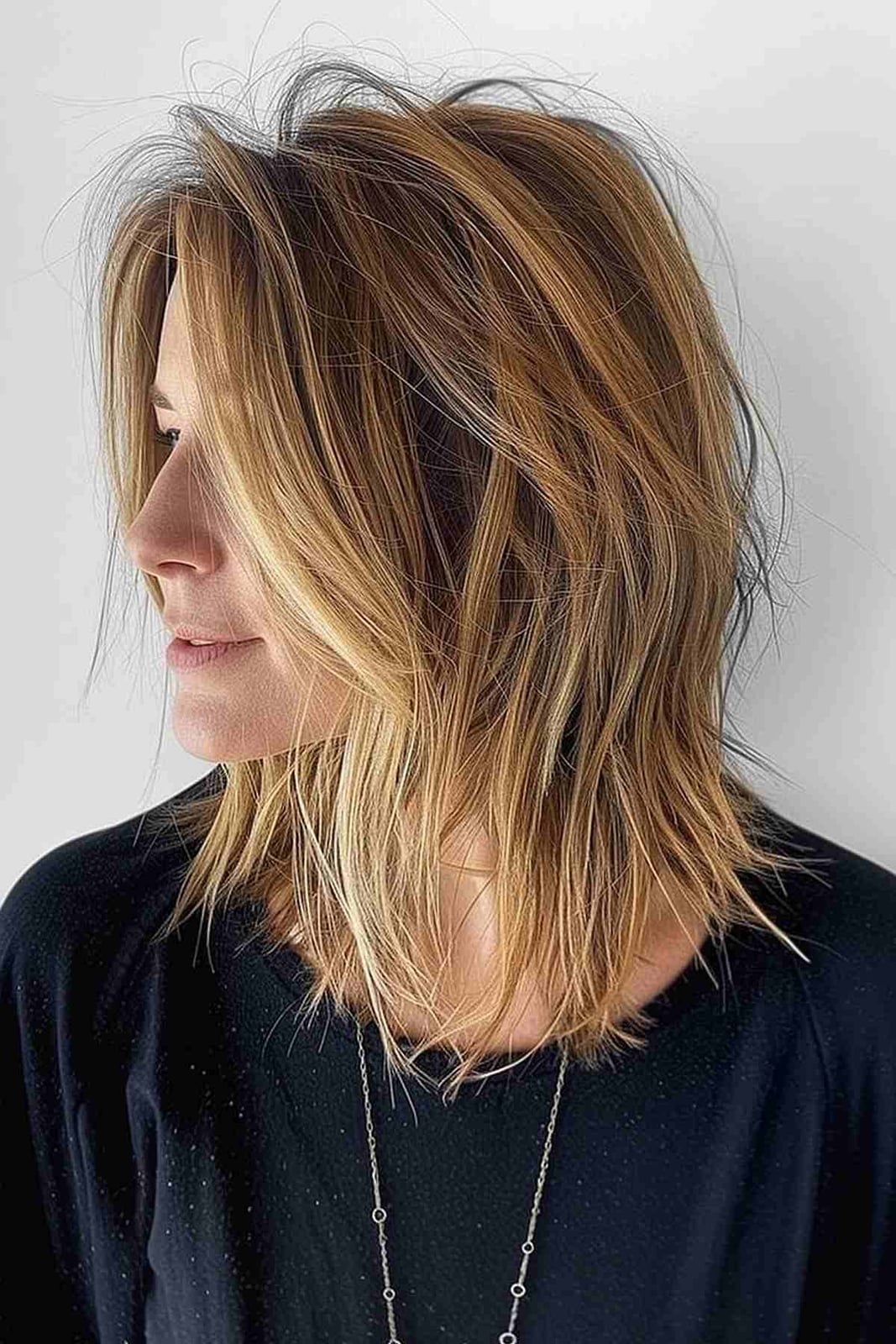 Dark Blonde Shag With Choppy Layers and Bangs Dark Blonde Shag With Choppy Layers and Bangs — Classy Choppy Layers