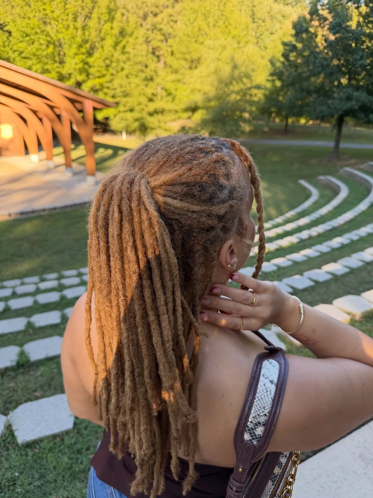Dark Brown Locs With Caramel Highlights Ponytail Dark Brown Locs With Caramel Highlights Ponytail — Classy Color Locs