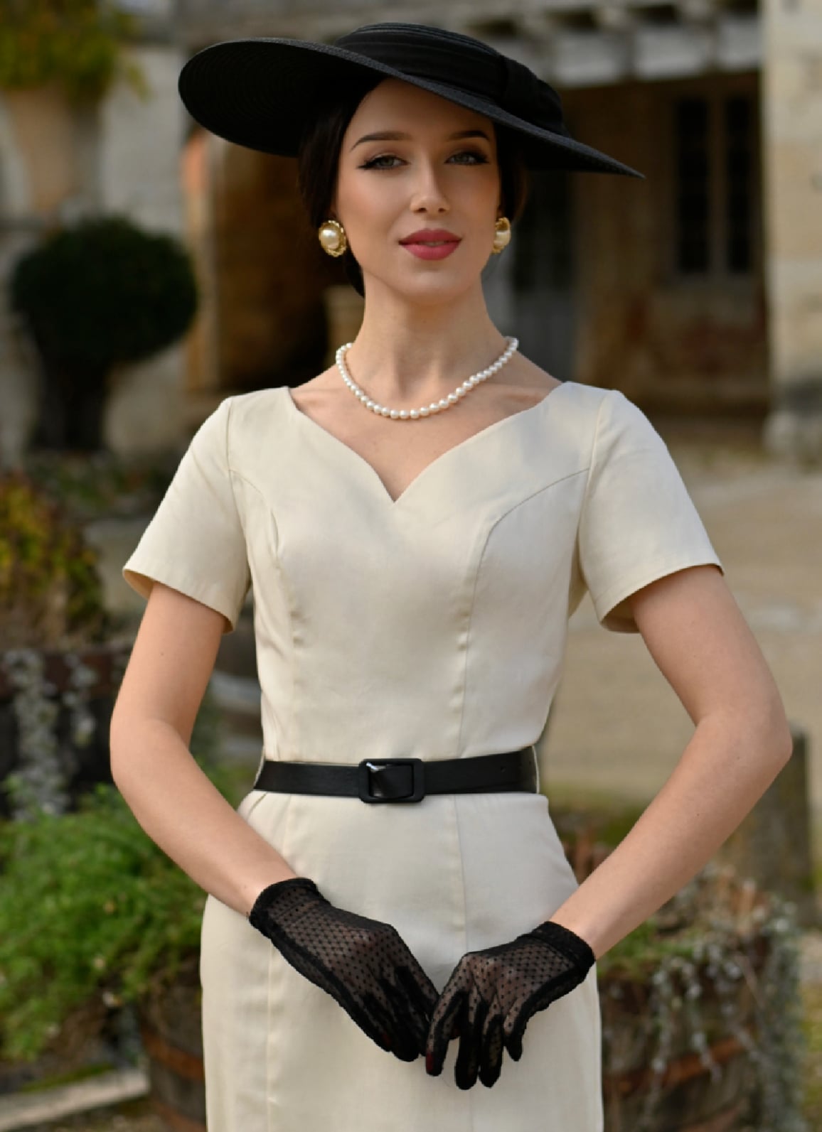 Cream Satin Sheath Dress with Black Accessories, Close-Up Take — Classy Cream Outfits