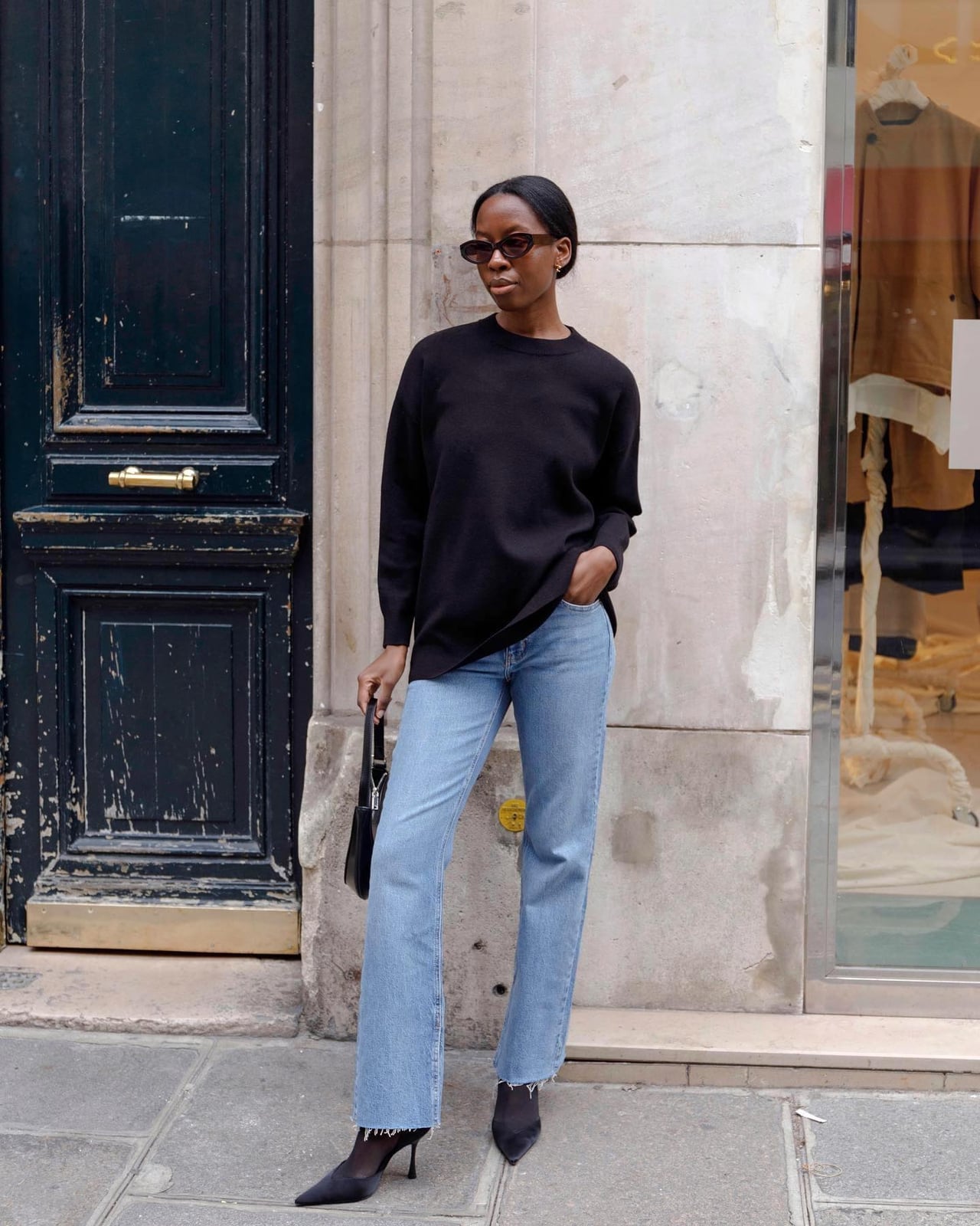 Black Crewneck Sweater With Light Blue Jeans And Heels — Classy Crewneck Outfits
