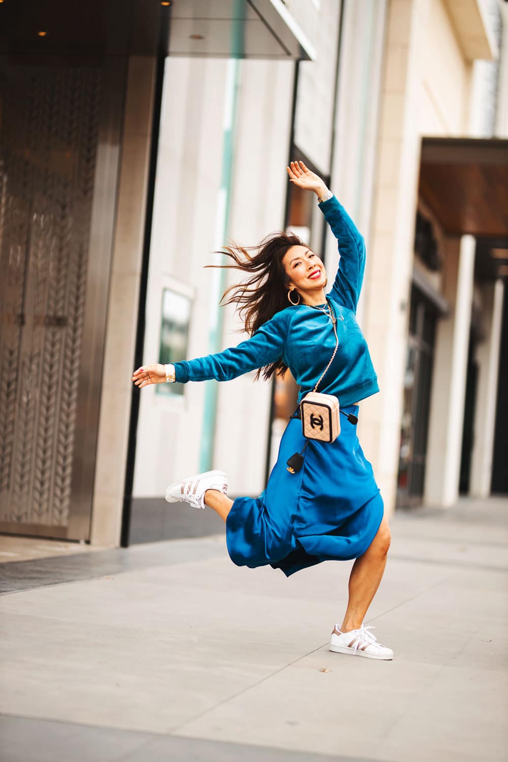 Teal Velour Sweatshirt With Satin Skirt And White Sneakers — Classy Crewneck Outfits
