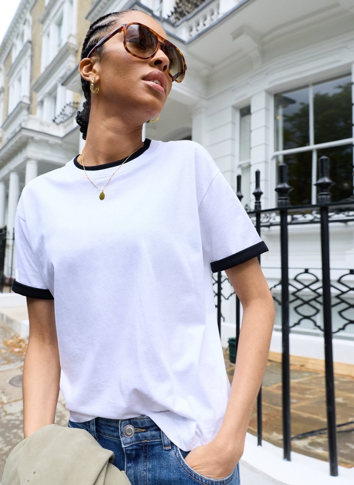 White Crewneck T Shirt With Black Trim And Blue Jeans — Classy Crewneck Outfits