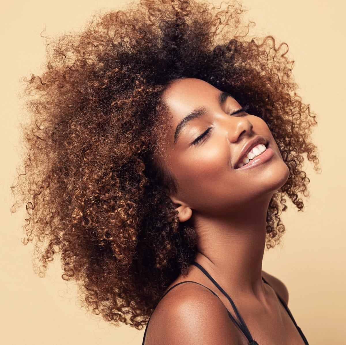Mid-Back Layers With Caramel Highlights Mid-Back Layers With Caramel Highlights — Classy Curly Hair Cutting