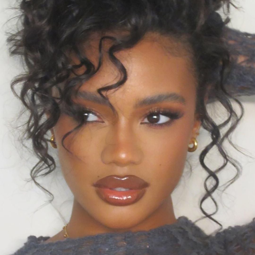 Mid-Back Black Layers With Volume Mid-Back Black Layers With Volume — Classy Curly Hair Cutting