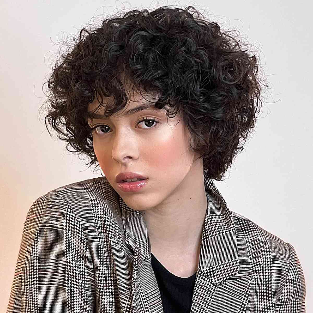 Short Black Curly Bob With Tight Curls Short Black Curly Bob With Tight Curls — Classy Curly Haircuts