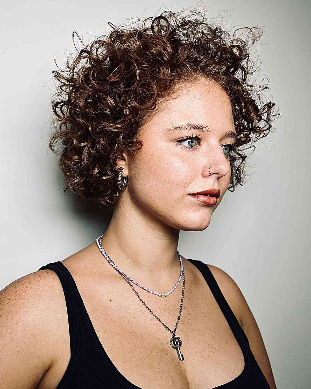 Short Auburn Pixie With Textured Curls Short Auburn Pixie With Textured Curls — Classy Curly Haircuts