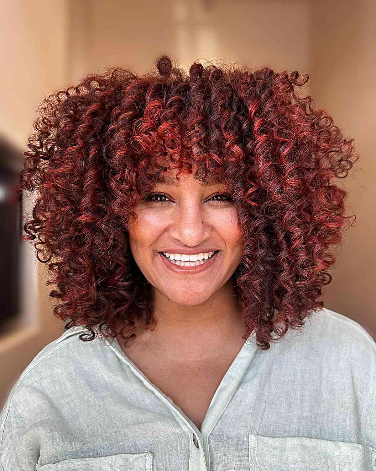 Collarbone Curls In Dark Red With Red Highlights Collarbone Curls In Dark Red With Red Highlights — Classy Curly Highlights