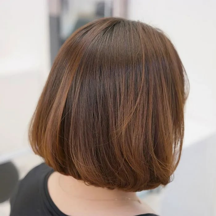 Collarbone Bob With Side-Swept Bangs And Layers Collarbone Bob With Side-Swept Bangs And Layers — Classy Cut Bob