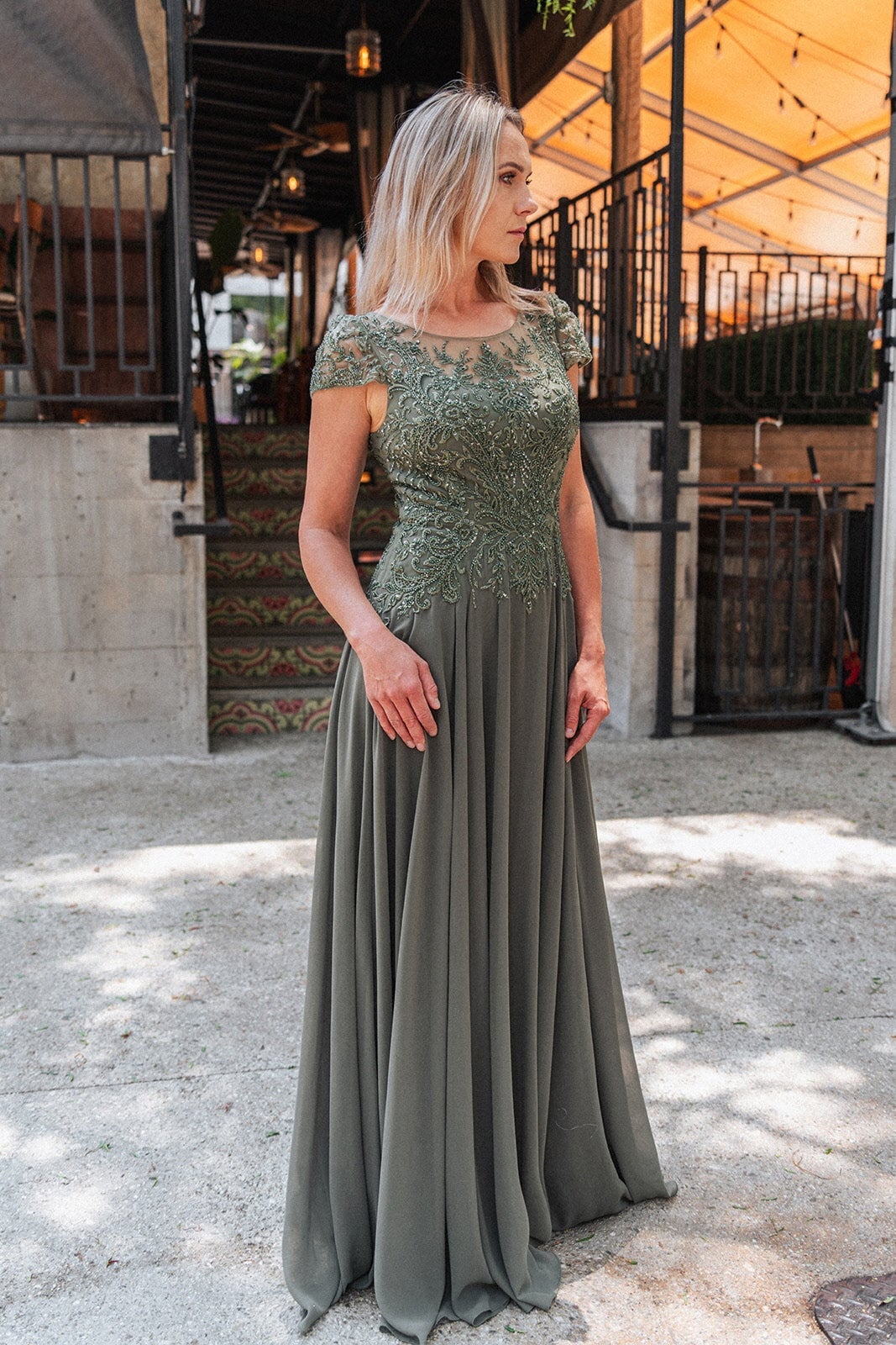 Olive Green Lace Bodice Chiffon A-Line Gown With She Wears Nude Heels — Classy Dresses for Moms