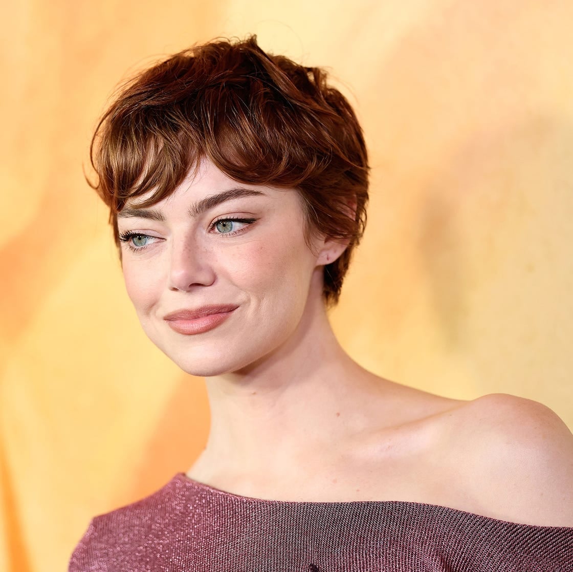Auburn Pixie With Wispy Textured Bangs Auburn Pixie With Wispy Textured Bangs — Classy Edgy Pixie