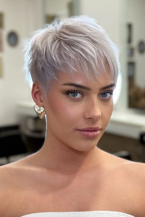 Icy Blonde Layered Pixie With Soft Texture Icy Blonde Layered Pixie With Soft Texture — Classy Edgy Pixie