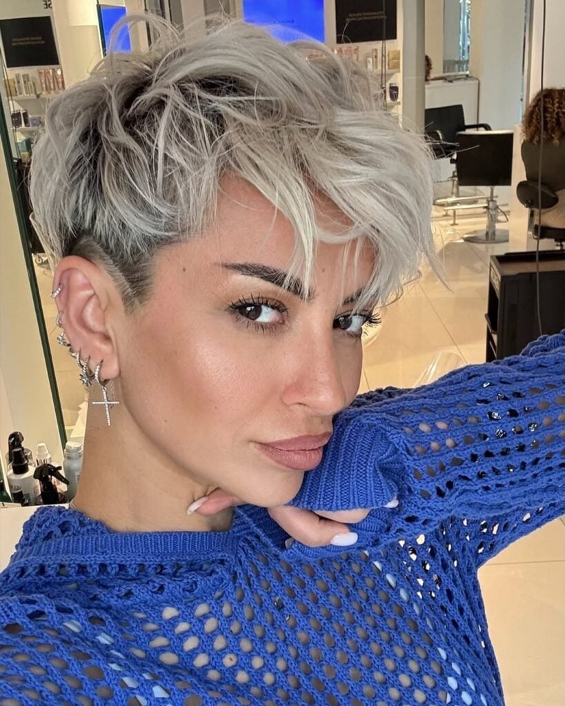 Ash Blonde Pixie With Long Sweeping Bangs And Undercut Ash Blonde Pixie With Long Sweeping Bangs And Undercut — Classy Edgy Pixie