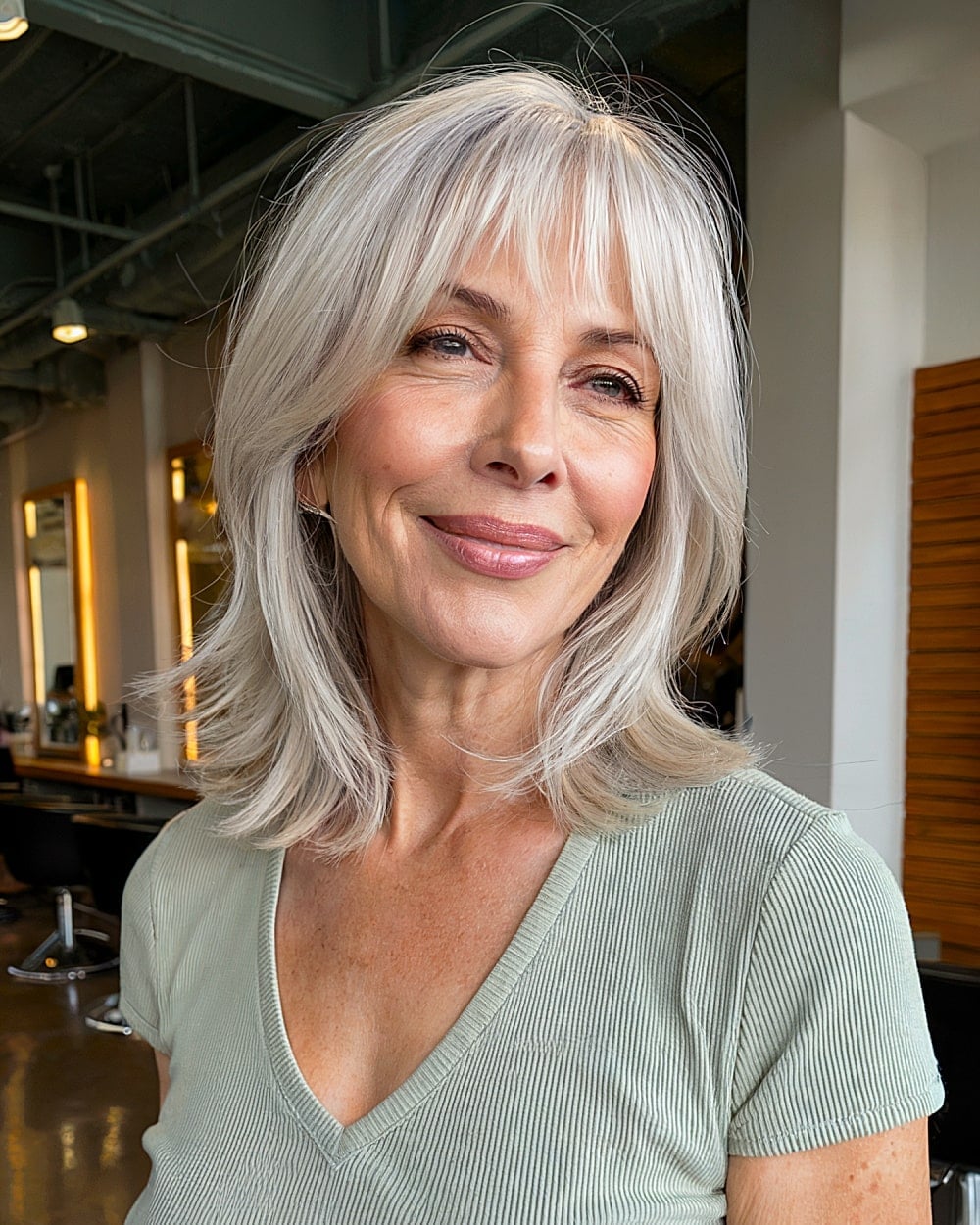 Collarbone Lob With Wispy Bangs Collarbone Lob With Wispy Bangs — Classy Face Framing Layers
