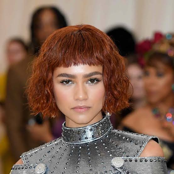 Chin Length Bob With Wispy Bangs — Classy French Bob