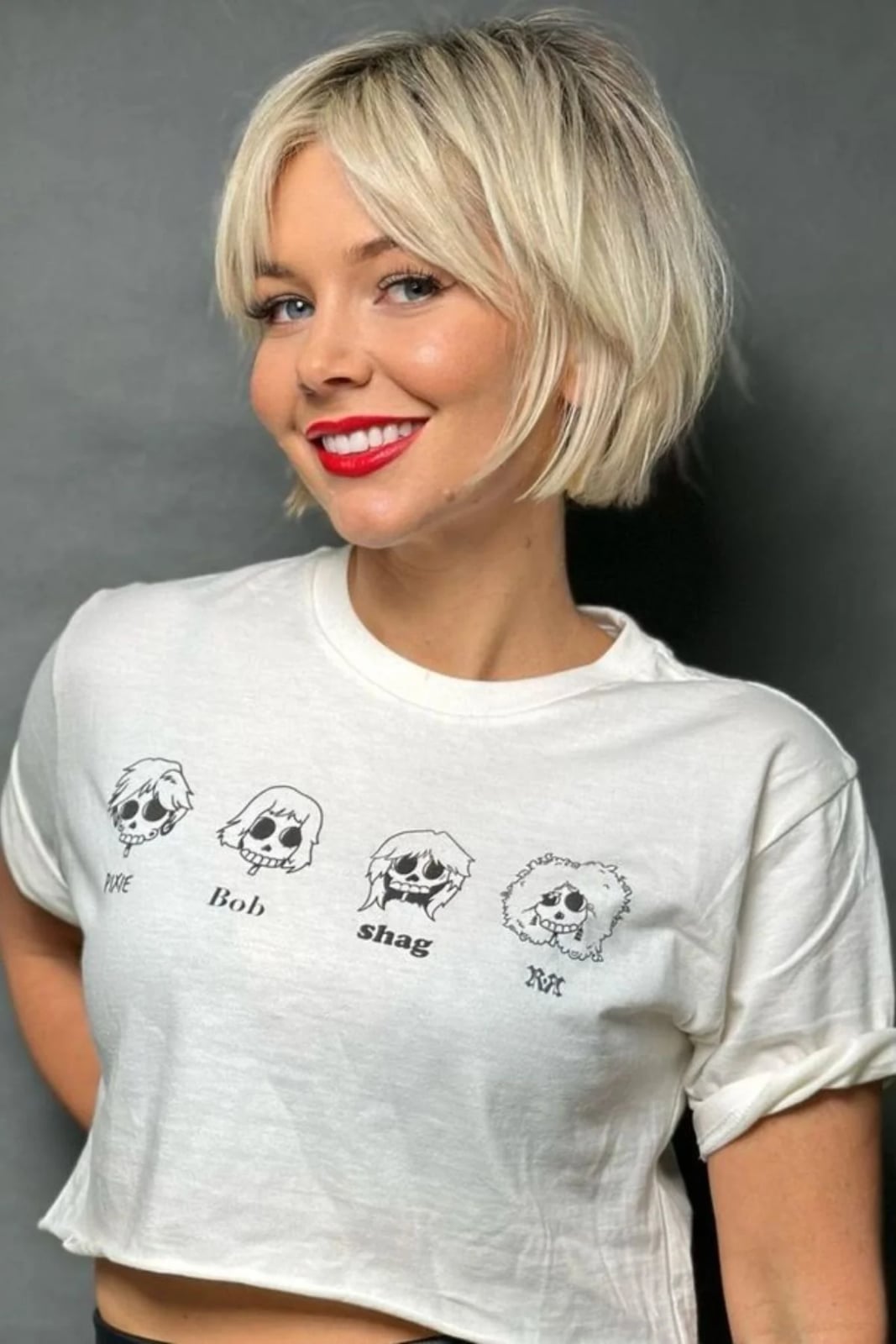 Dark Brown Bob With Textured Curtain Bangs Dark Brown Bob With Textured Curtain Bangs — Classy French Bob Haircut