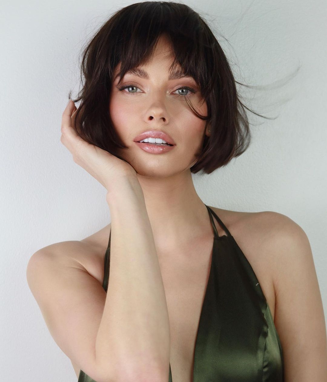 Dark Brown Bob With Textured Curtain Bangs, Wavy, Close-Up Take Dark Brown Bob With Textured Curtain Bangs, Wavy, Close-Up Take — Classy French Bob with Bangs