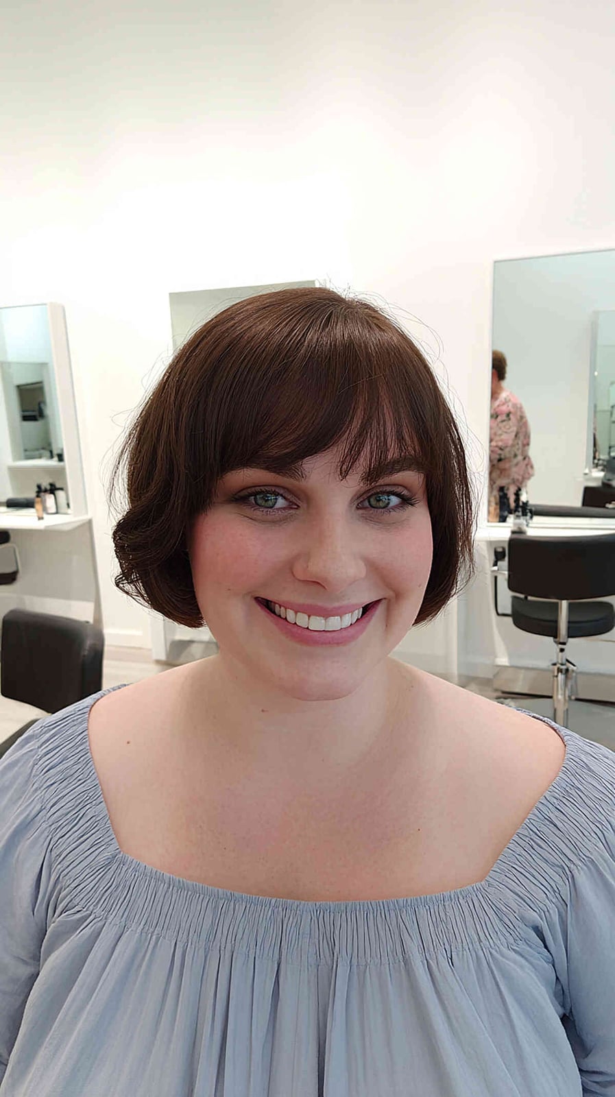 Medium Brown Bob With Soft Curtain Bangs and Styled With Gentle Waves Medium Brown Bob With Soft Curtain Bangs and Styled With Gentle Waves — Classy French Bob with Bangs