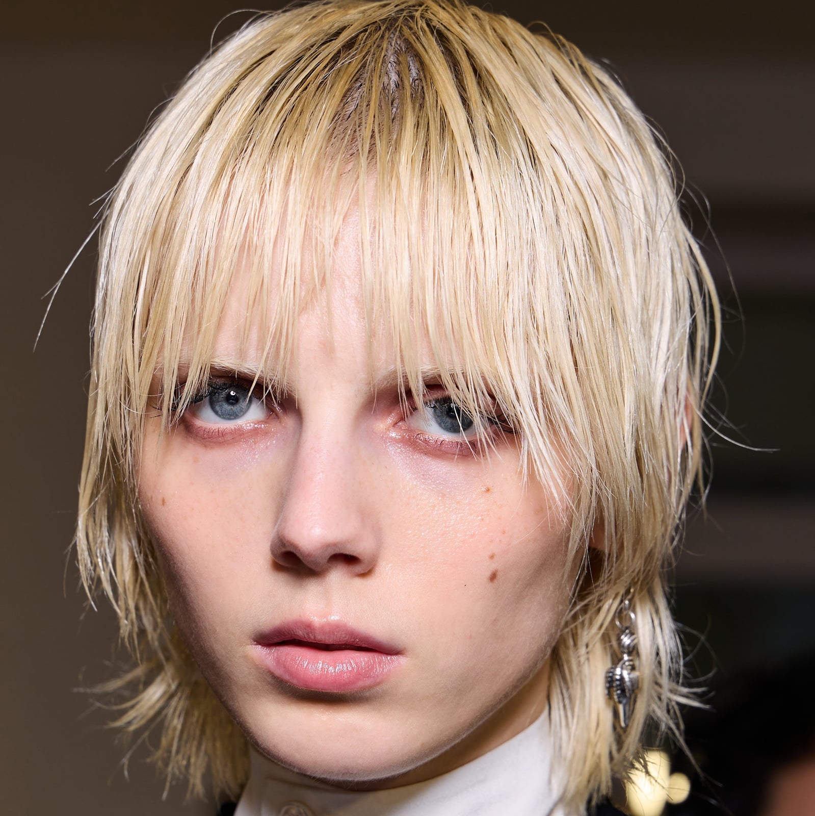Ash Blonde Bob With Wet Look Wispy Bangs Ash Blonde Bob With Wet Look Wispy Bangs — Classy French Bob with Bangs