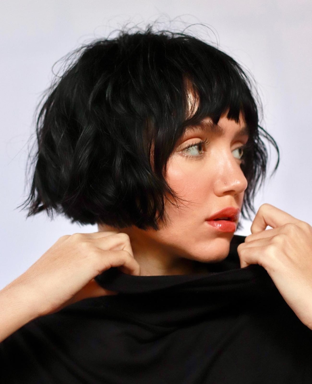 Sharp Black Bob With Inward Curled Ends Sharp Black Bob With Inward Curled Ends — Classy French Bob with Bangs