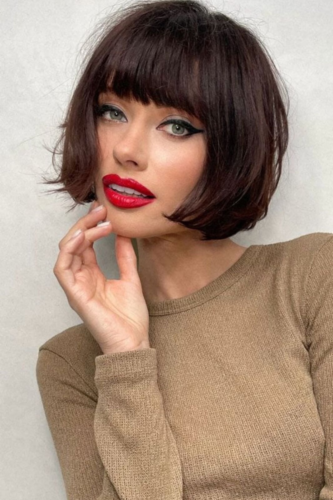 Glossy Dark Brown Bob With Precise Blunt Bangs Glossy Dark Brown Bob With Precise Blunt Bangs — Classy French Bob with Bangs