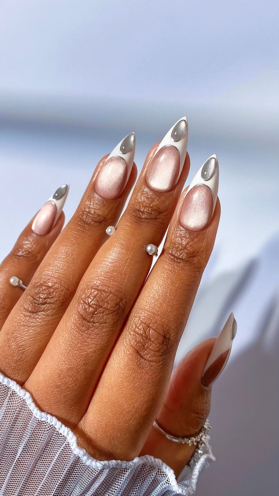 Sharp Almond Pearlescent Pink Cat-Eye Nails Sharp Almond Pearlescent Pink Cat-Eye Nails — Classy Glass Nails