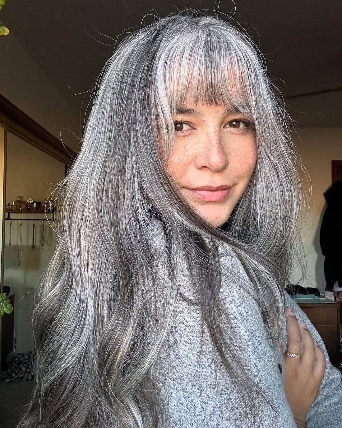Mid-Back Layers With Full Bangs Mid-Back Layers With Full Bangs — Classy Gray Blending Hair