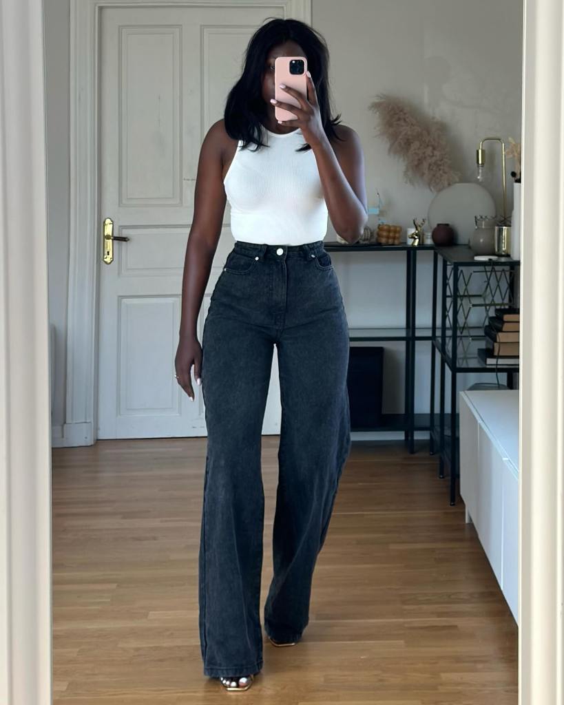 Dark Gray Wide Leg Jeans With White Ribbed Tank, Close-Up Take Dark Gray Wide Leg Jeans With White Ribbed Tank, Close-Up Take — Classy Gray Jeans Outfits