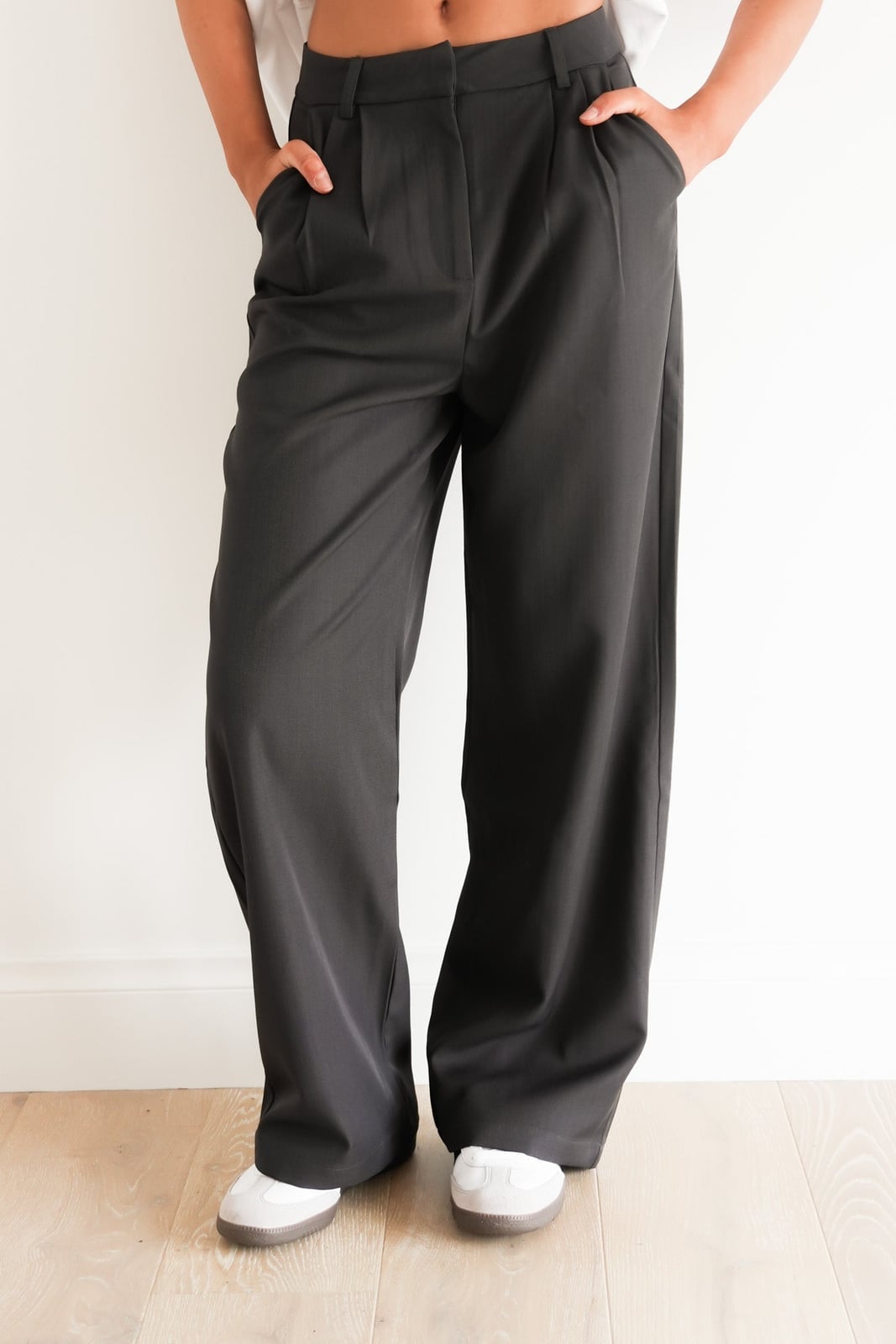 Charcoal Gray Tailored Trousers With Pleated Front, Close-Up Take — Classy Gray Pants Outfits