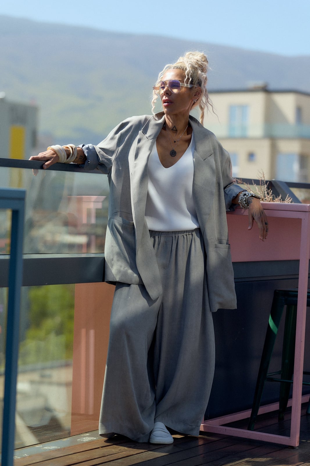 Gray Wide Leg Trousers With White Tank And Oversized, Close-Up Take — Classy Gray Pants Outfits