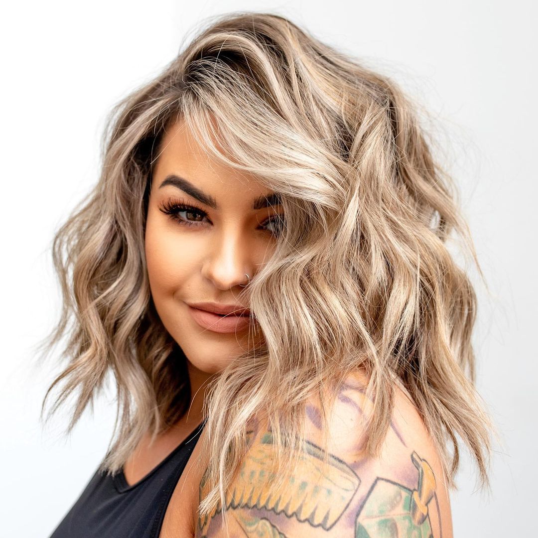 Angled Ash Blonde Lob With Wispy Bangs Angled Ash Blonde Lob With Wispy Bangs — Classy Hair for Round Face
